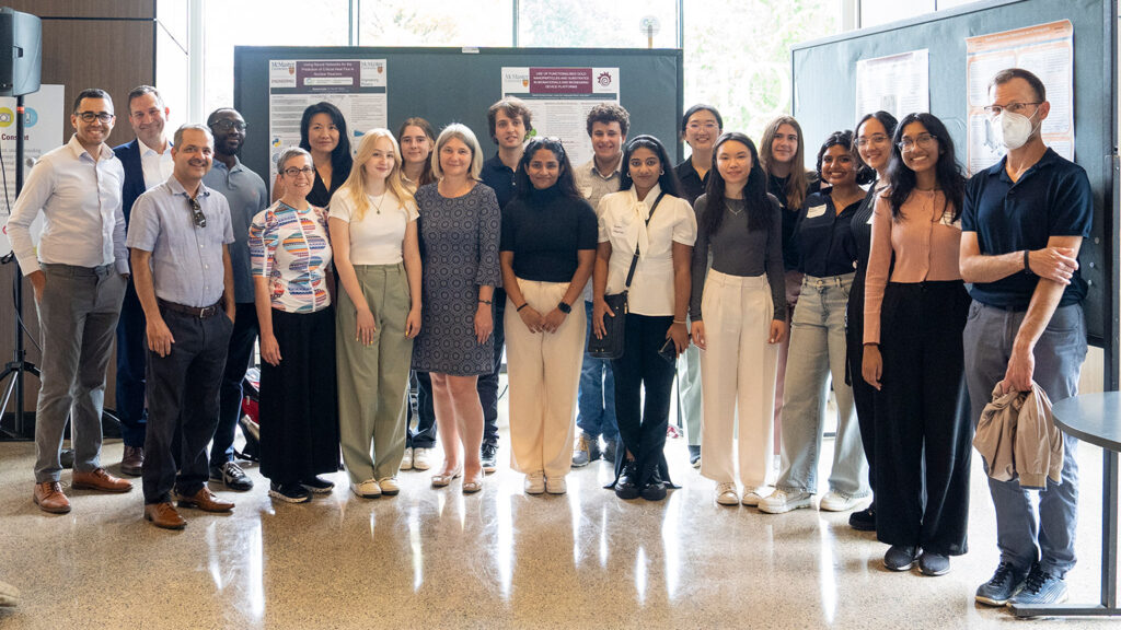 Engineering and Science students who were a part of the Canadian Nuclear Summer Research Program pose together in front of their posters at the showcase event