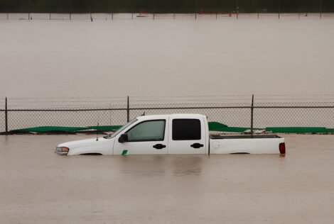 White truck submerged in flood water during the 2013 Calgary flo