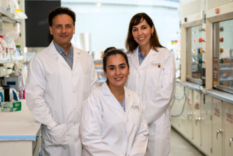 Researchers posing in lab coats