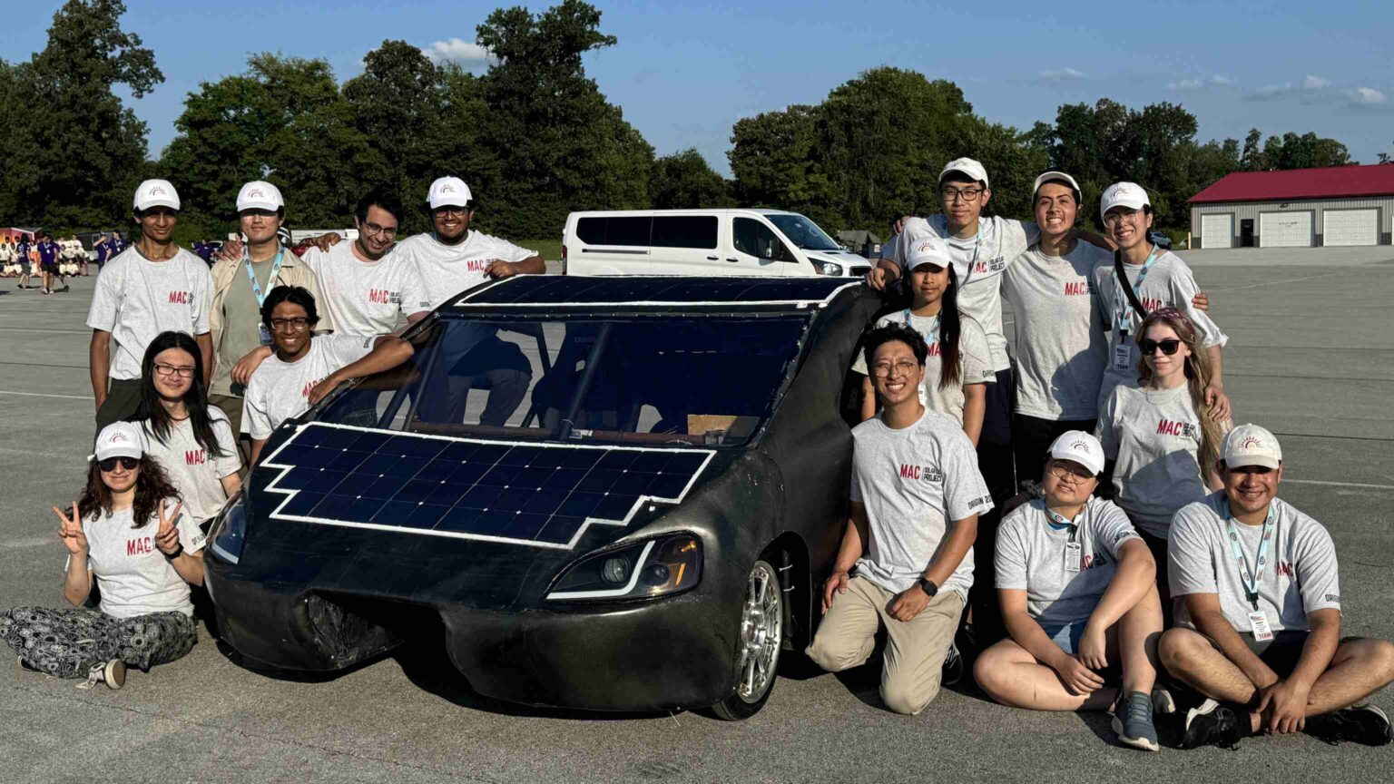 McMaster Solar Car Team Photo with car