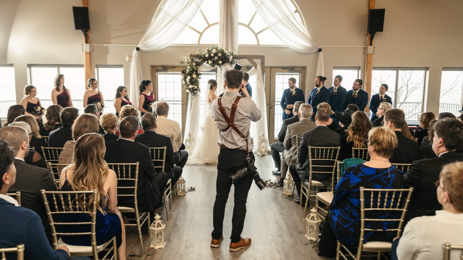 Geoff shaw photographing a wedding ceremony