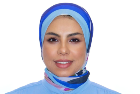 headshot of Eman Rezk.