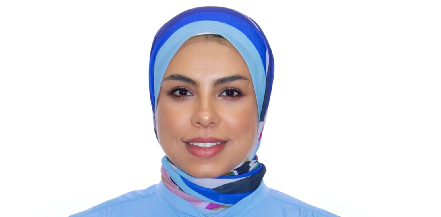 headshot of Eman Rezk.